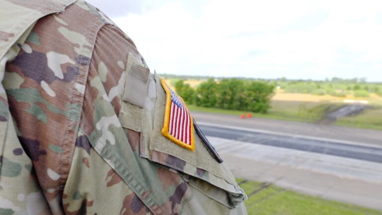 badge of the US flag on Army uniform