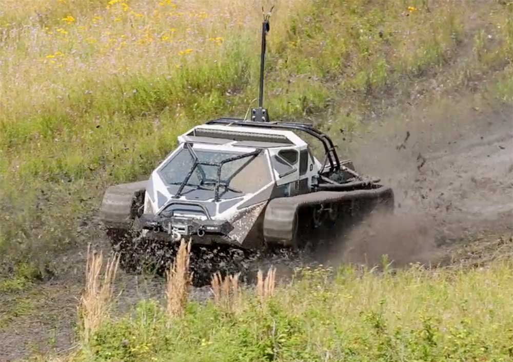 A robotic vehicle navigates the off-road trails on The RELLIS Campus.