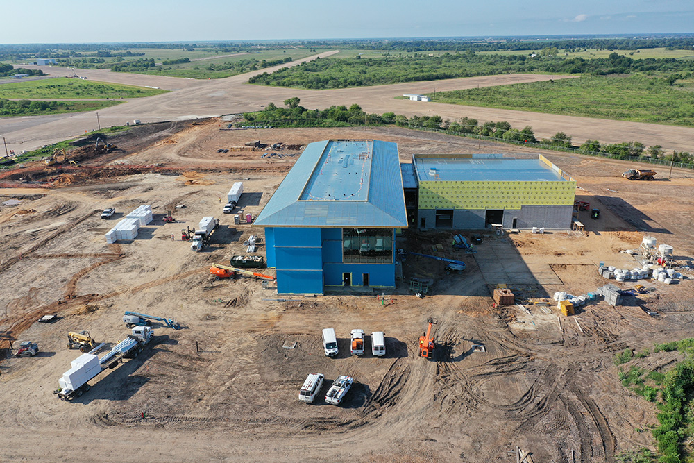 RIC-aug7-2.jpg construction progress aerial photo of the RIC building.