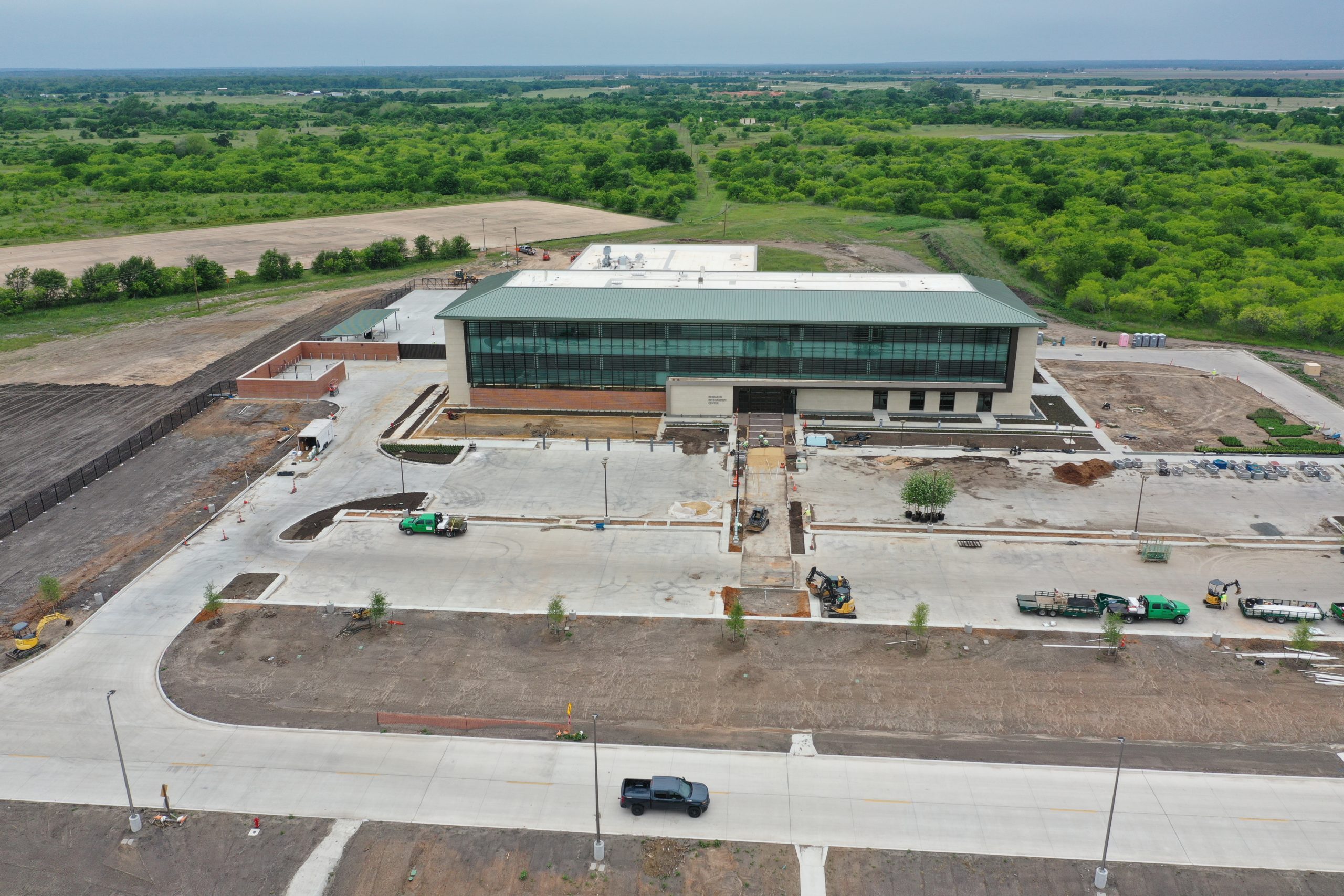 default Aerial view of the Research Integration Center on the RELLIS Campus - a green expanse of land.